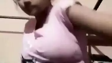 Cute Indian babe makes sex fans see her saggy XXX boobs via webcam