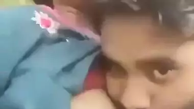 Indian outdoor sex of a guy sucking his GF’s tight boobs