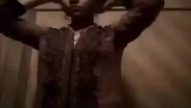 Young Desi babe is busy making XXX video of her cute small tits