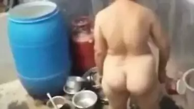 Video from , village aunty taking bath in outdoor taken by her son