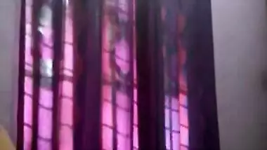 Tempting teen Desi lies down on her back to rub XXX body for sex show