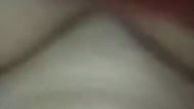 Indian holds a sex camera and touches her own XXX jugs and shaved slit