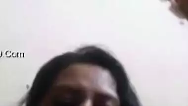 Desi mom simply sits in front of camera and talks with serious face