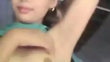 Small-tittied Desi girl with sexy appearance presents XXX video