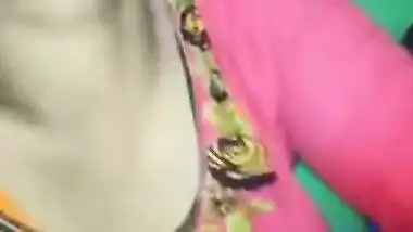 Female in a pink sari allows Indian man to touch her XXX boobs