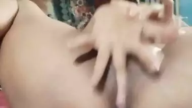 Sexy young beautiful deshi girl is liking her tight vagina with a sex toy