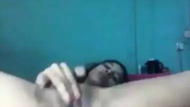 Indian girl masturbates XXX slit with fingers when there is no guy for sex