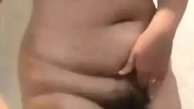 Desi woman with big tits is going to take a shower in solo porn video