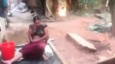 Chubby Indian temptress loves her sex hole and washes it in a trough