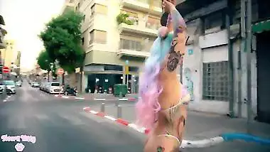 Colorful kawaii girl twerking in empty street during quarantine (no nudity)