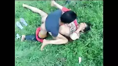 Green grass is perfect for Indian couple to practice porn action on it